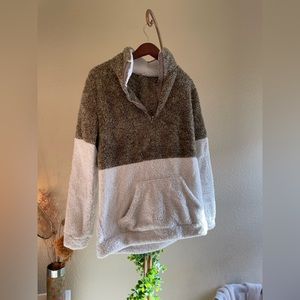 Furry sweater brown and white.